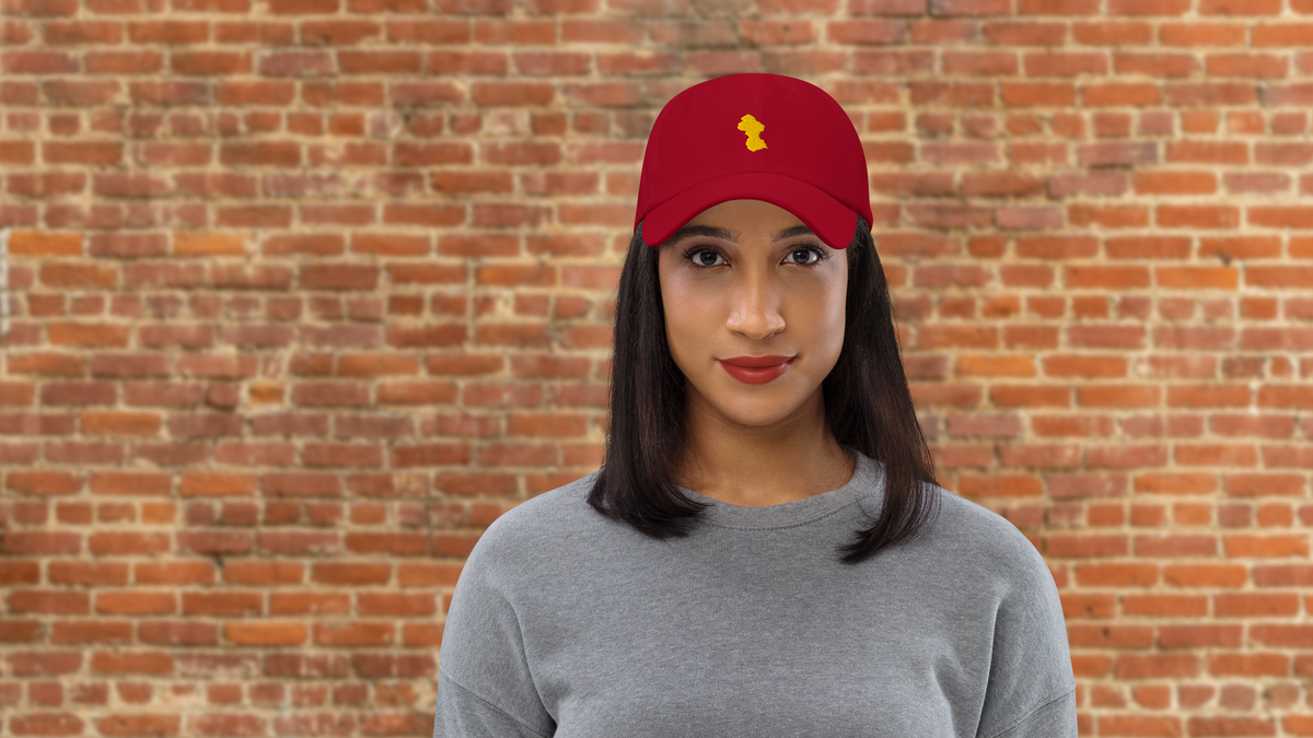 Model wearing a We Are Guyana embroidered Guyana hat